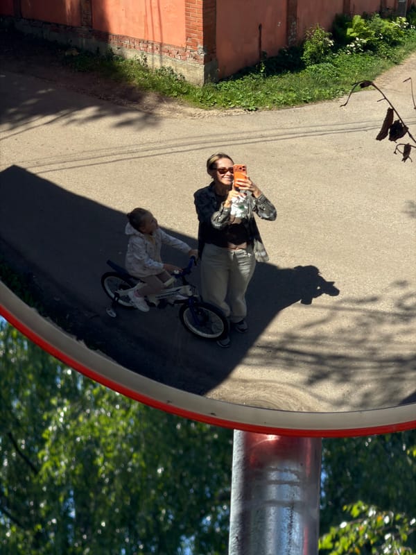Lazy summer morning in Malakhovka: bikes, cats, and mirrors