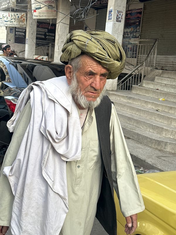 Everyday street life on a Quetta city pavement