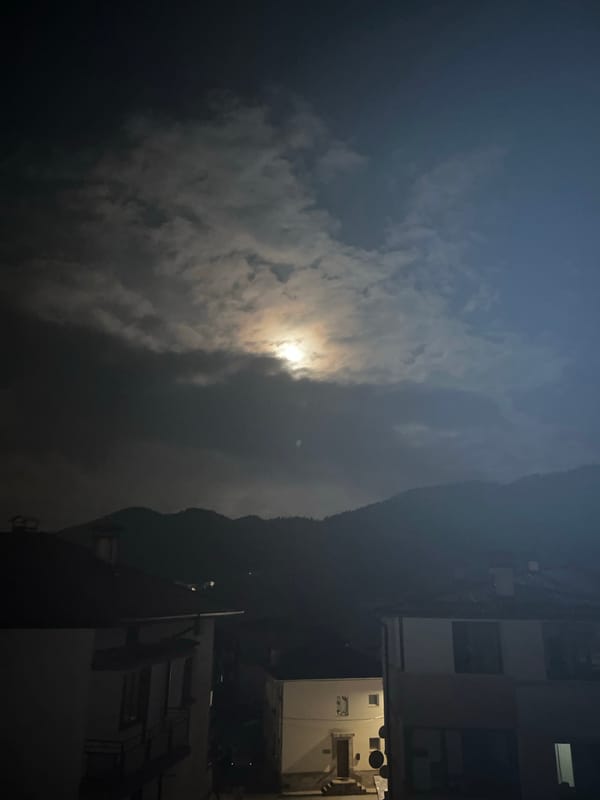 Cloudy night scene captured in Smolyan residential area