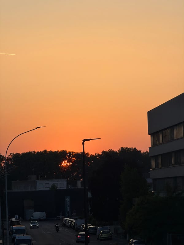 Strasbourg streets glow under a warm June sunset