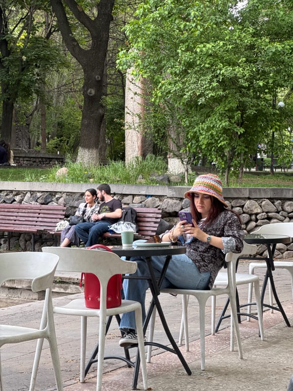 Cafe scenes documented in Yerevan's modern waterside district