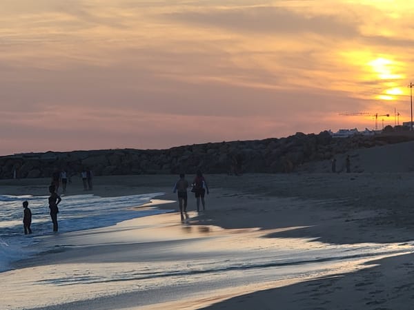 Quarteira beach at golden hour, winding down for the evening