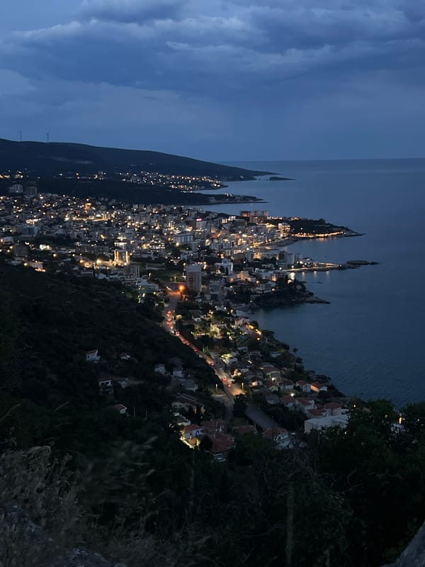 Twilight settles over Dobra Voda's coastal hillside