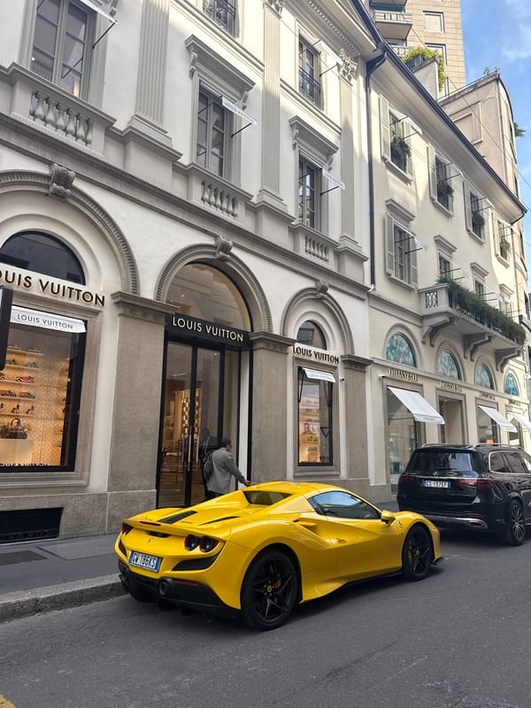 Yellow Ferrari spotted on Milan streets during sunny afternoon