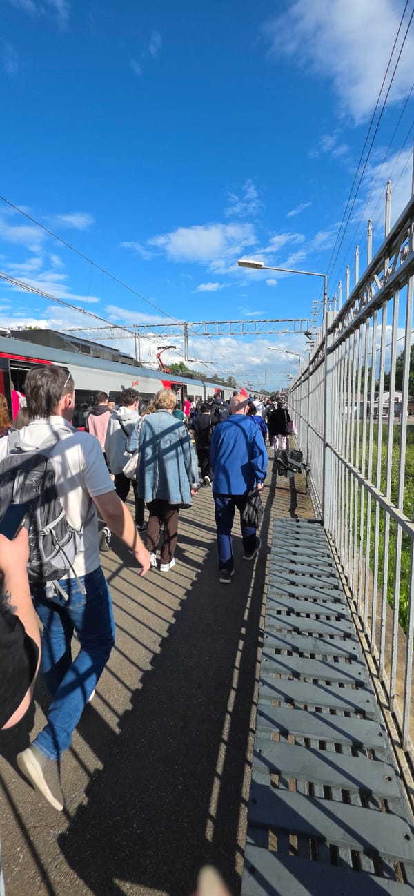 Lastochka train station activity with parks and canals nearby