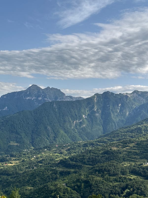 Green hills and valley spread across Montenegro's Dragovića Polje.