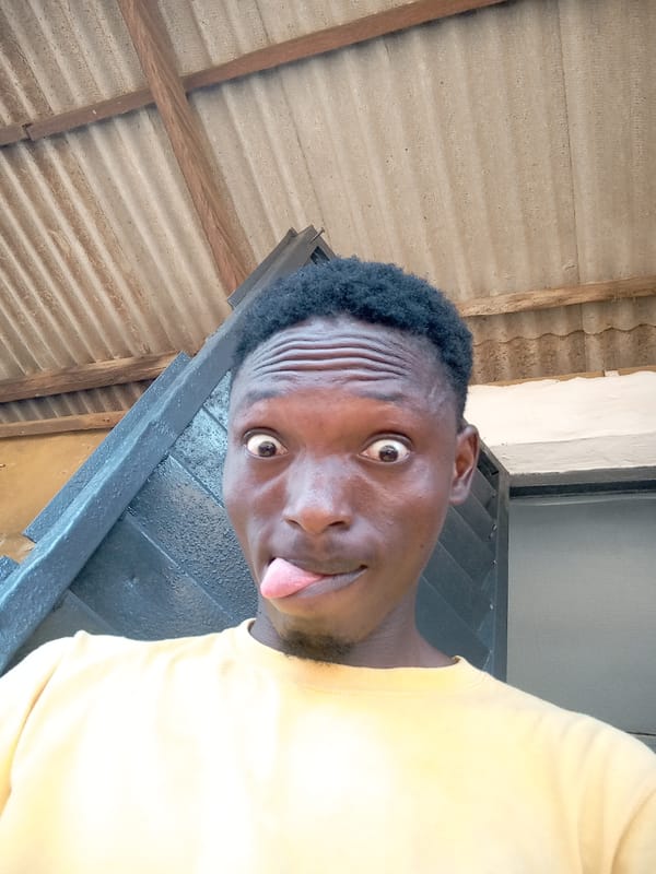 Man takes playful selfies in rural setting with motorcycle, goat