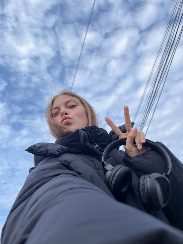 Woman photographed under cloudy skies in Foki, Russia