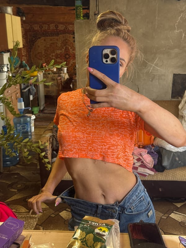 Woman Takes Selfies Indoors in Rosstani, Russia