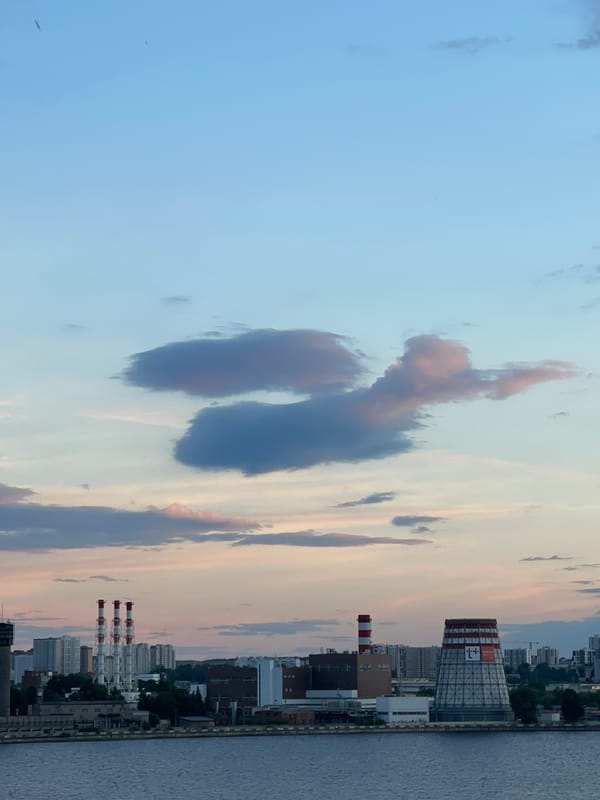 Evening life captured across urban waterfront during sunset hours