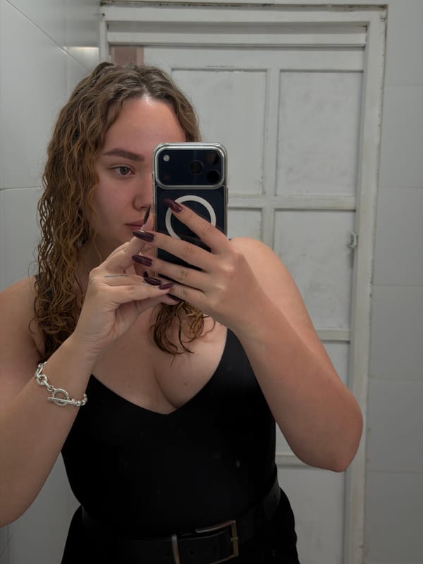 Woman takes selfie in Ramat Gan bathroom
