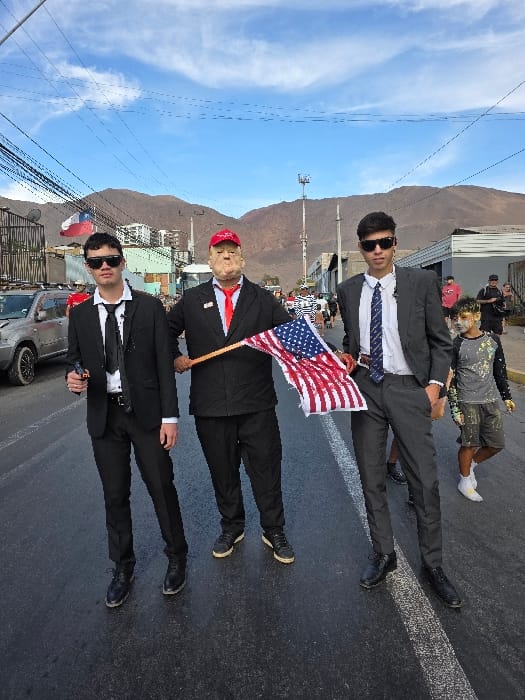 Paint-covered crowds celebrate street festival in Iquique, Chile