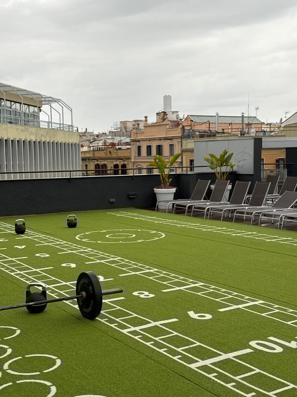 Rooftop gym activity captured near Barcelona's Sagrada Família
