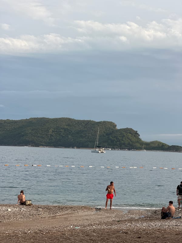 A lazy afternoon along Budva's pebble beach and streets