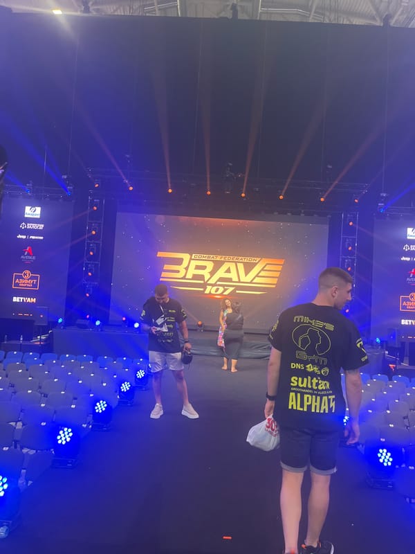 Behind the scenes at a BRAVE 107 MMA event setup