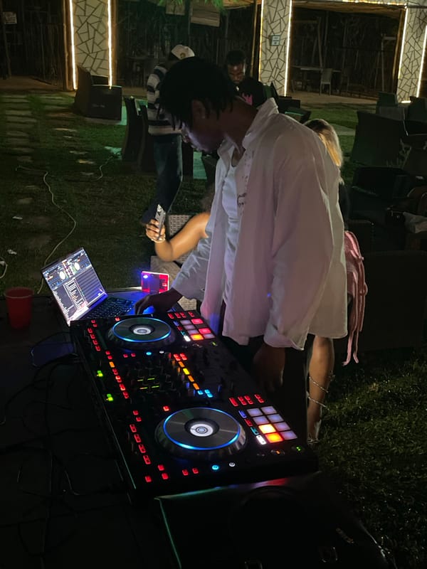 Late-night outdoor party in Abuja with DJ and dancing