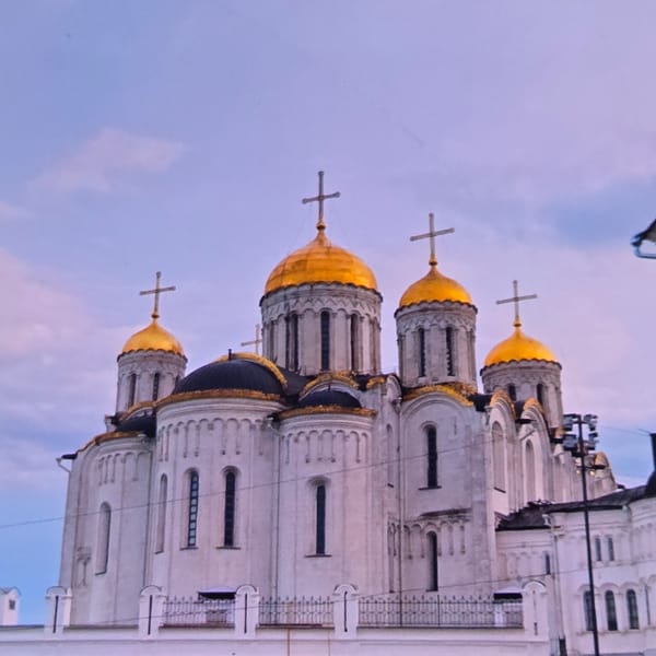 Quiet morning in Vladimir: cathedral domes, cats, and waterside scenes