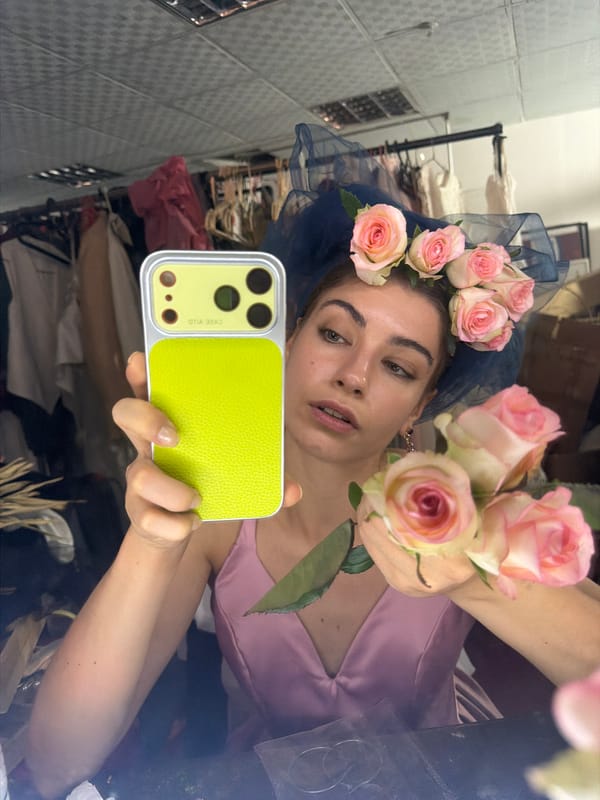 Mirror selfies in a Chancheng boutique, pink dress and florals