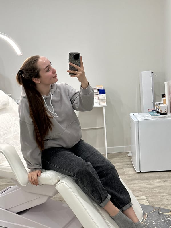 Woman receives facial treatment at medical facility in Russia