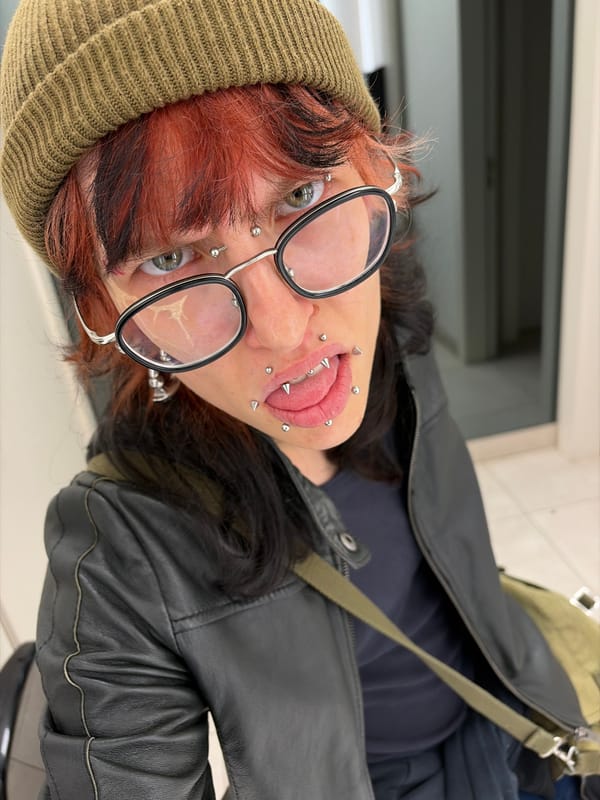 Person with facial piercings photographed in Busmantsi elevator