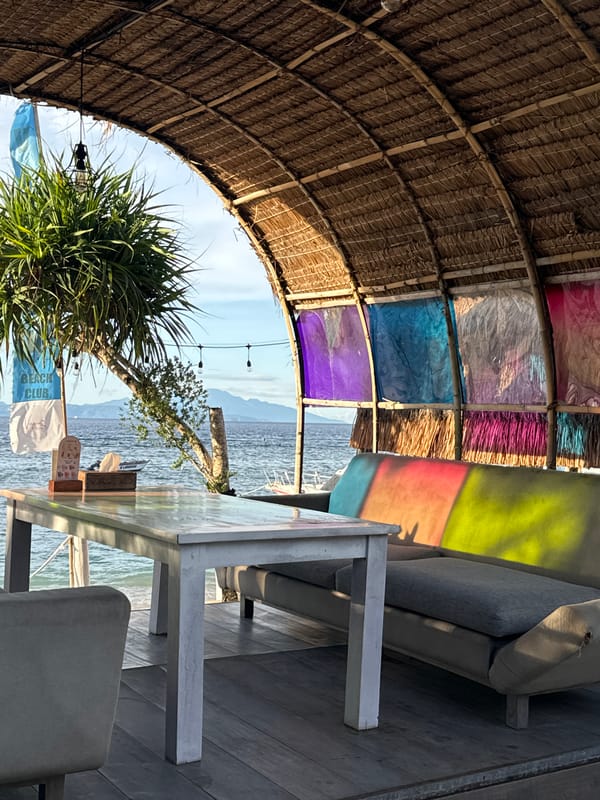 Tourist documents breakfast at Nusa Penida beach restaurant