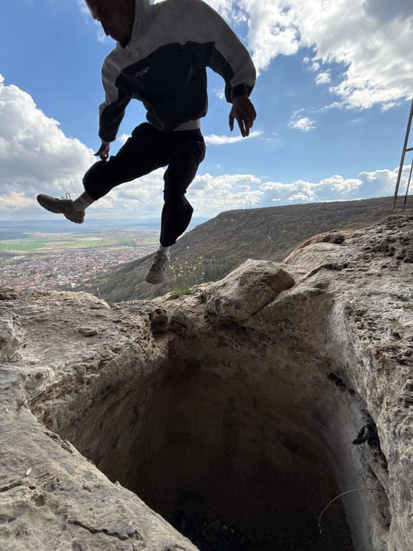 Person dangles from cliff overhang in Shumen, Bulgaria