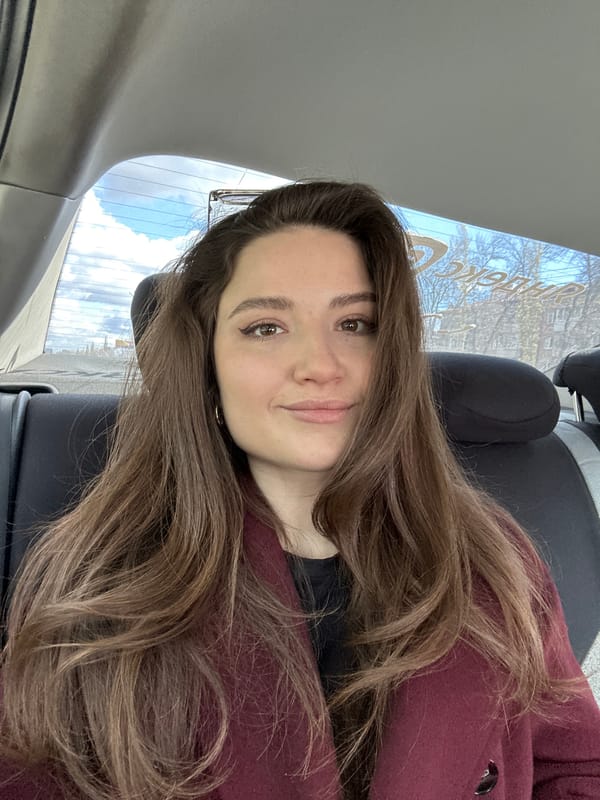 Woman takes morning selfie in car in Ufa