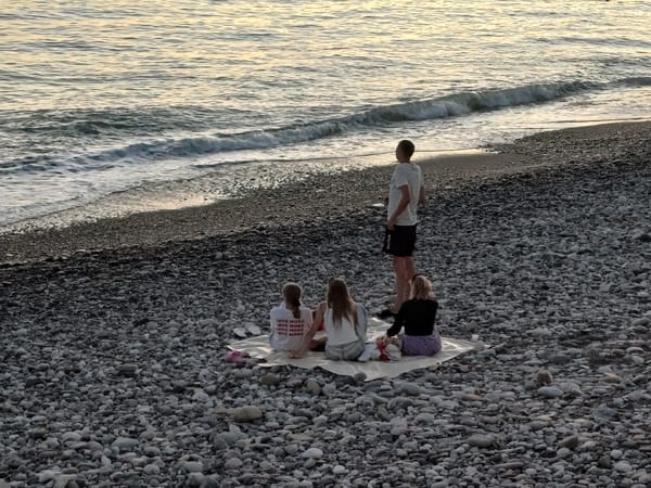 Sunset picnic on Sochi's Black Sea pebble beach