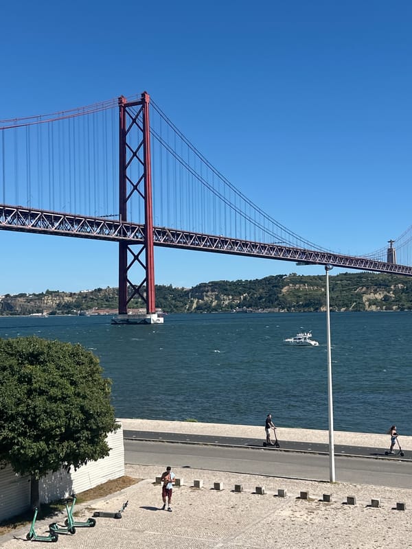 Lisbon's 25 de Abril Bridge from every angle on a sunny afternoon