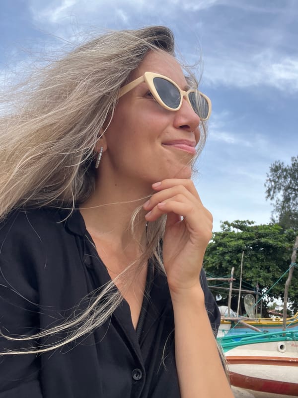 Weligama beach: selfies, shore birds, and a fishing boat