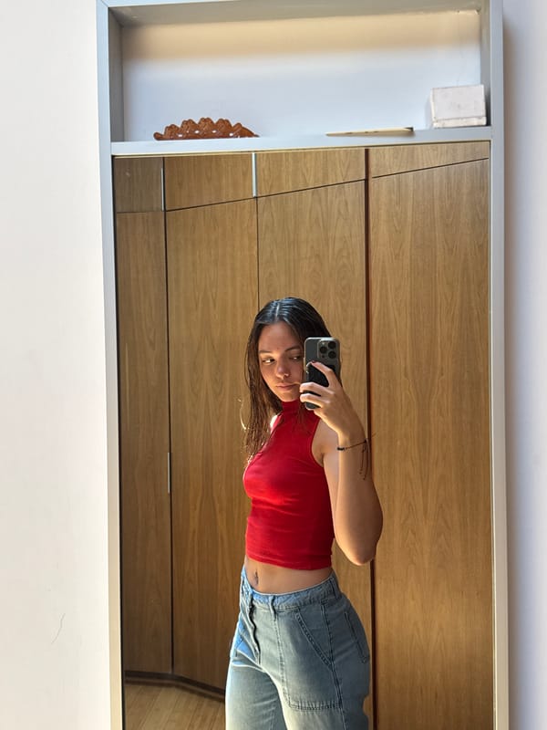 Woman takes mirror selfies in San Bernardino Tlaxcalancingo