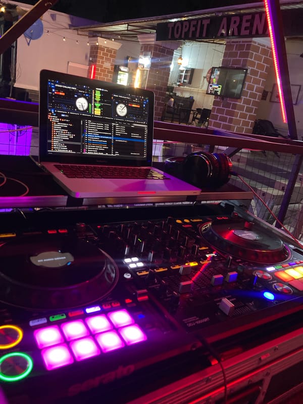Serato DJ setup running at an evening event in Gwarinpa