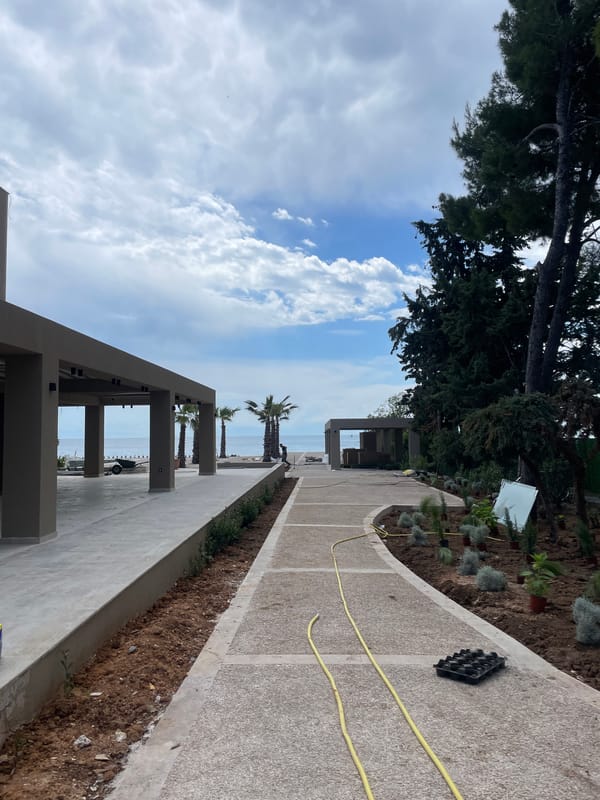 Coastal landscaping project documented in Πόρτες, Greece