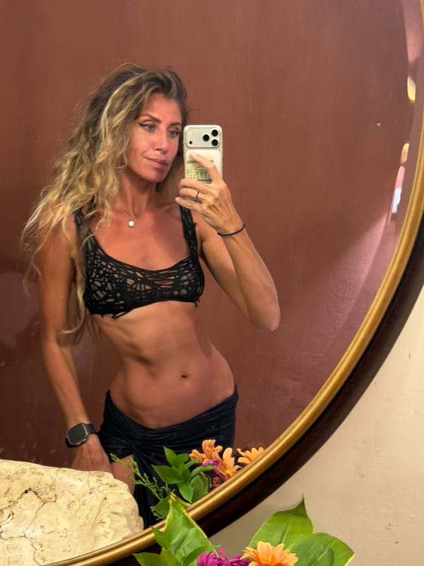 Mirror selfies in a moody, ornate room in Ubud