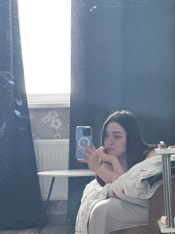 Woman documents morning routine in Perm apartment