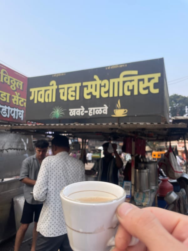 Late-night tea service at traditional stall in Kolhapur