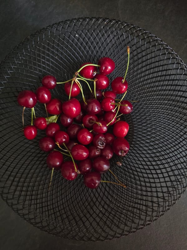 Coffee, cherries, and cartoons on a slow morning in