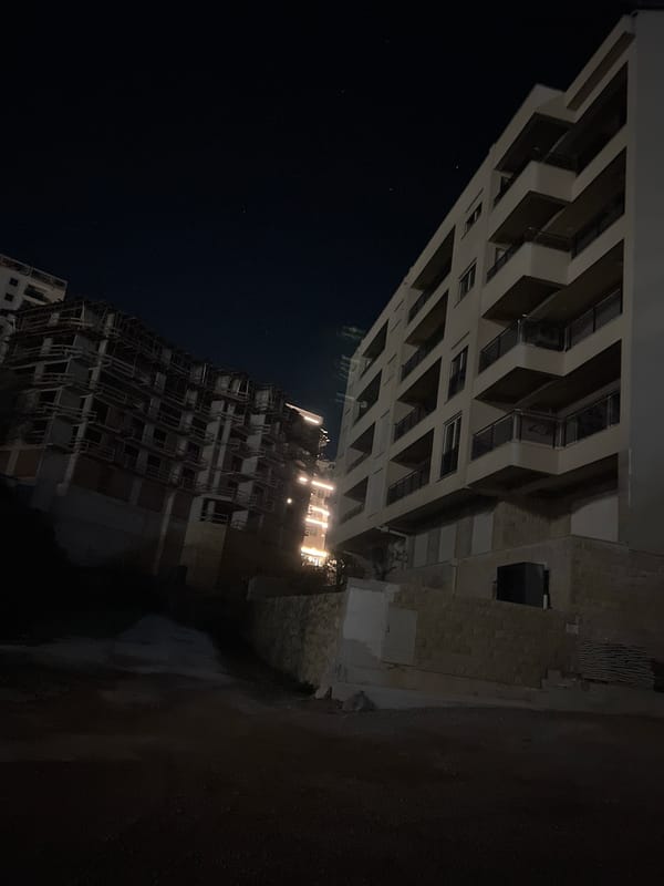 Night view of residential buildings in Boreti, Montenegro