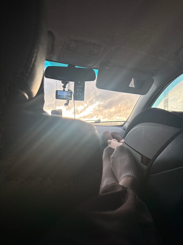 Bright sunlight creates glare through car windshield in Russia