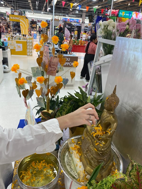 Buddha blessing ritual observed at Thai restaurant