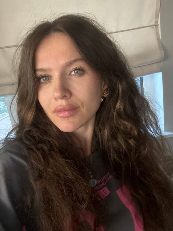 Woman takes selfie indoors in Khimki, Russia