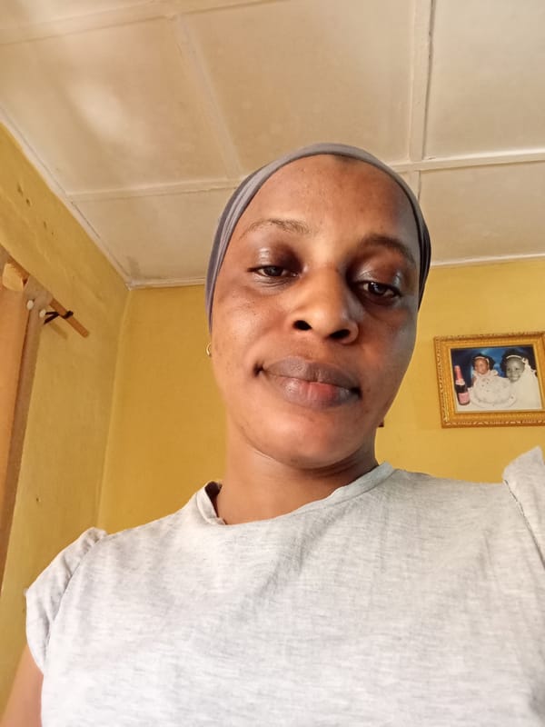 Woman photographed indoors in Narayi, Nigeria