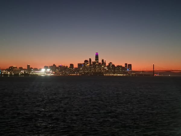 San Francisco skyline glows at dusk in twilight colors