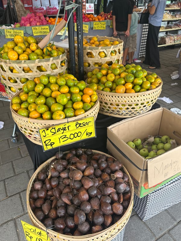 Sukawati fruit market stalls stocked with fresh local produce