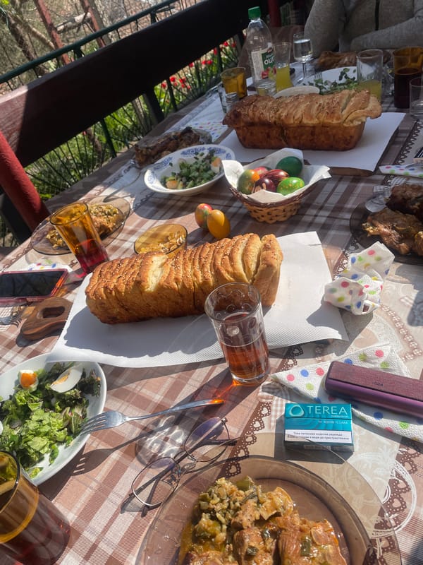 Outdoor meal with traditional foods observed in Sadovets, Bulgaria