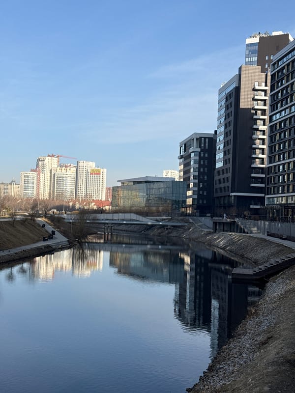 Yekaterinburg cityscape reflected in water captured by witness