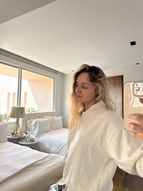 Woman takes bedroom selfies in Mexico City apartment