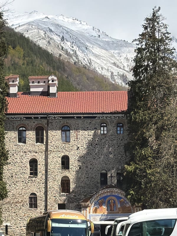 Rila Monastery captured amid snow-covered Bulgarian mountain landscape