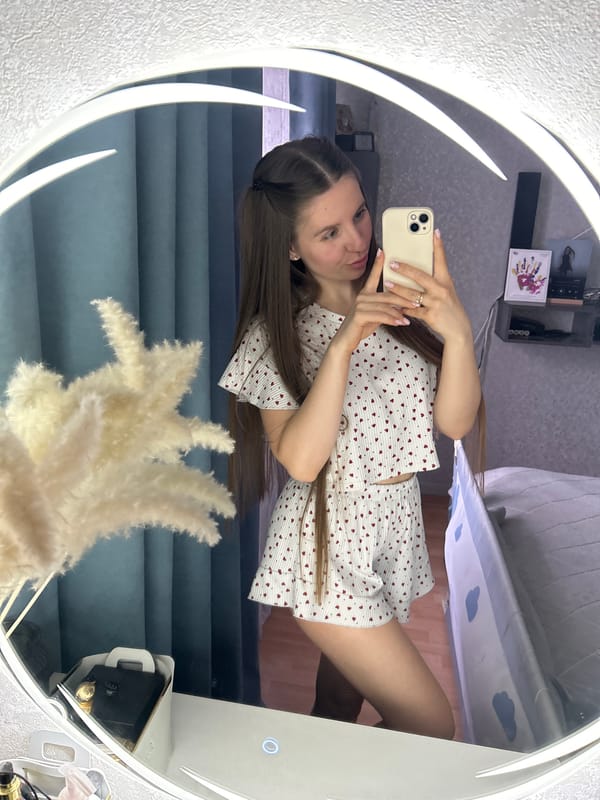 Woman takes ring light selfie in Klin, Russia