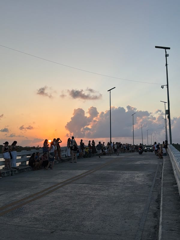 Crowds gather on bridge in General Luna, Philippines